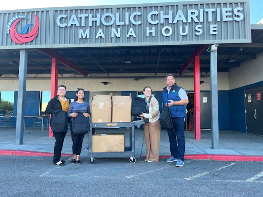 Veterans Day 2024 donation of 25 backpacks for homeless veterans from Catholic Charities Mana house