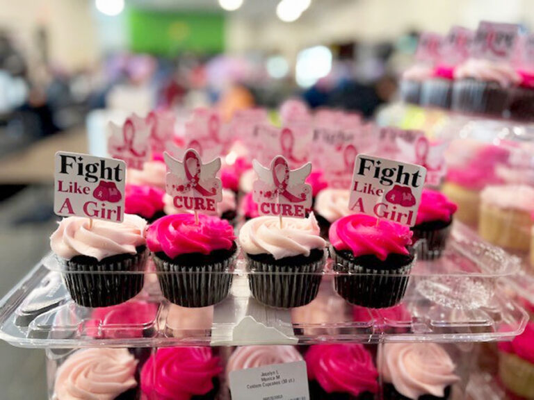 Pink cupcakes on display for breast cancer awareness